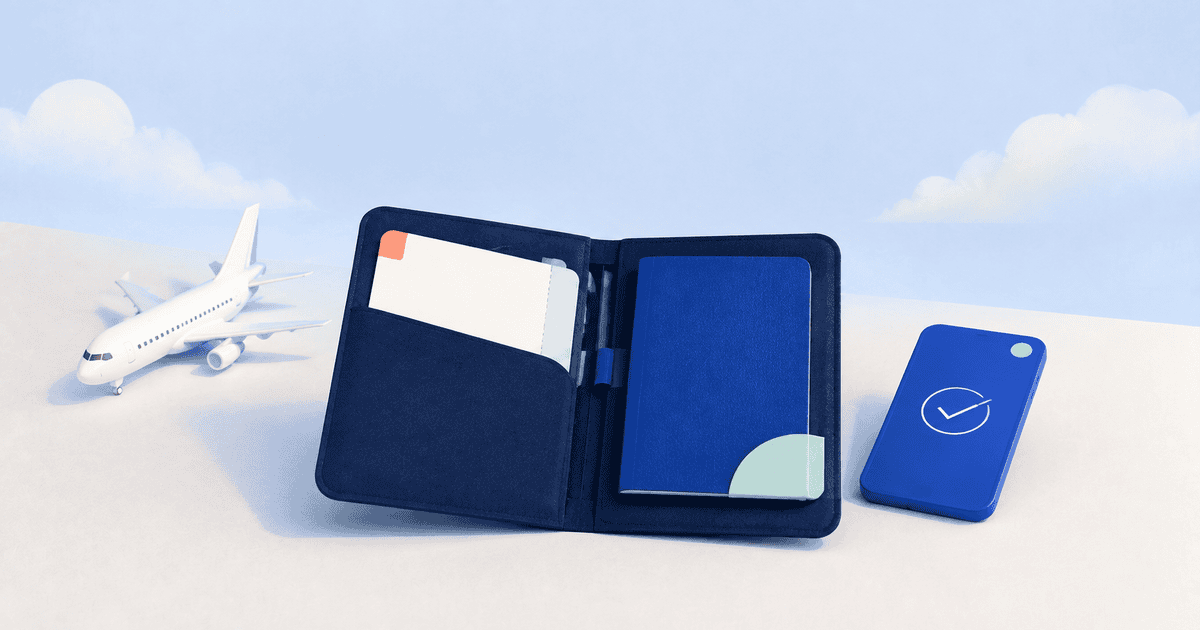 Open navy travel folio with a boarding pass and passport beside a checked trip card and model airplane